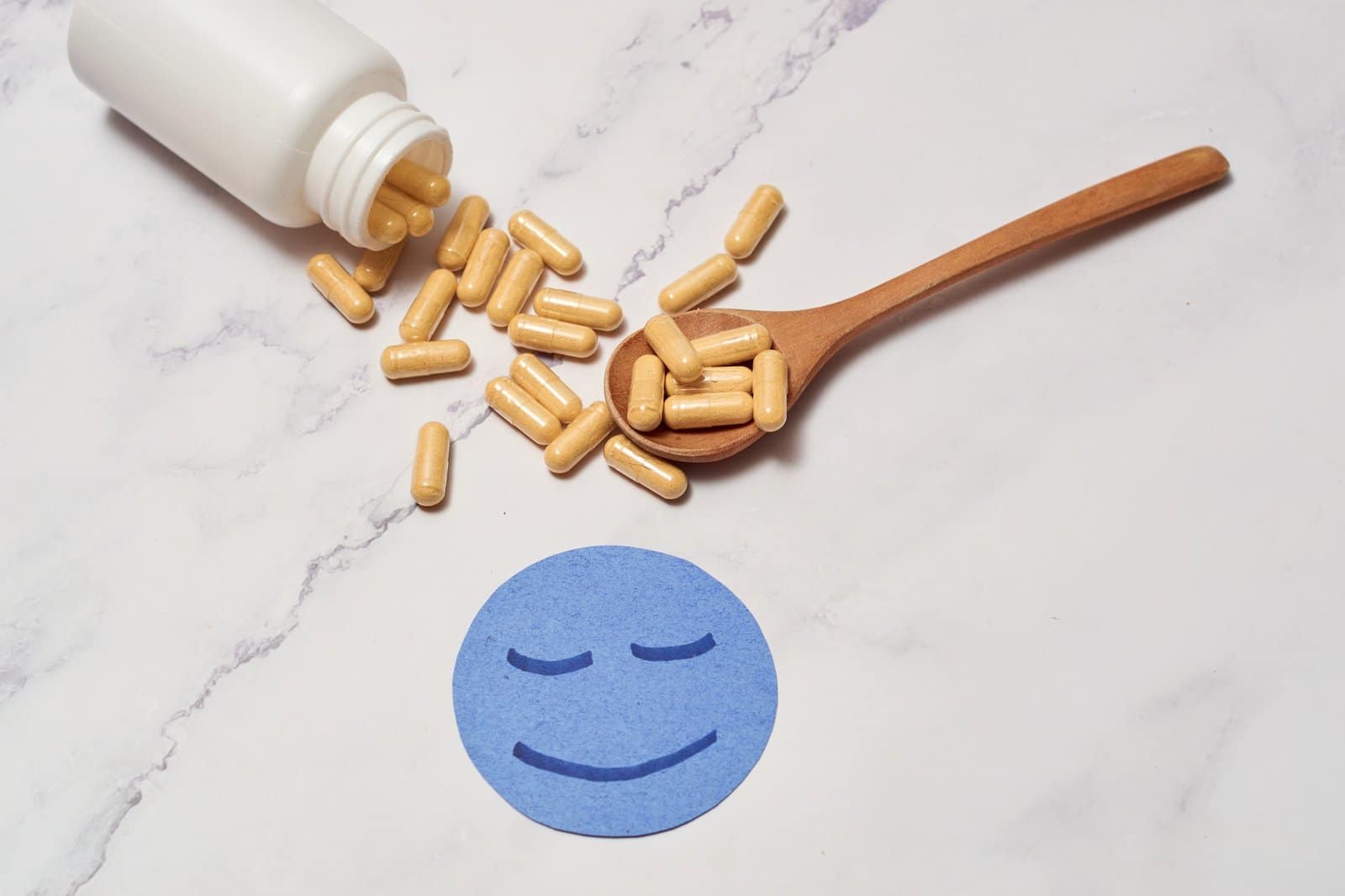 Pills of nutritional supplements and probiotics for better digestion.